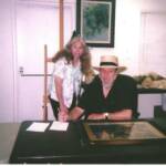 Grand prize winner Linda Hall is seen with world famous wildlife Artist John Seerey-Lester. Mr. Seerey-Lester and his wife Suzi proved very gracious hosts and signed Linda’s painting “ Florida Treasure” and gave her a tour of his studio.