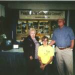 Ken & Theresa, two of our founding Directors, pose with Alexis. Thanks go out all three!